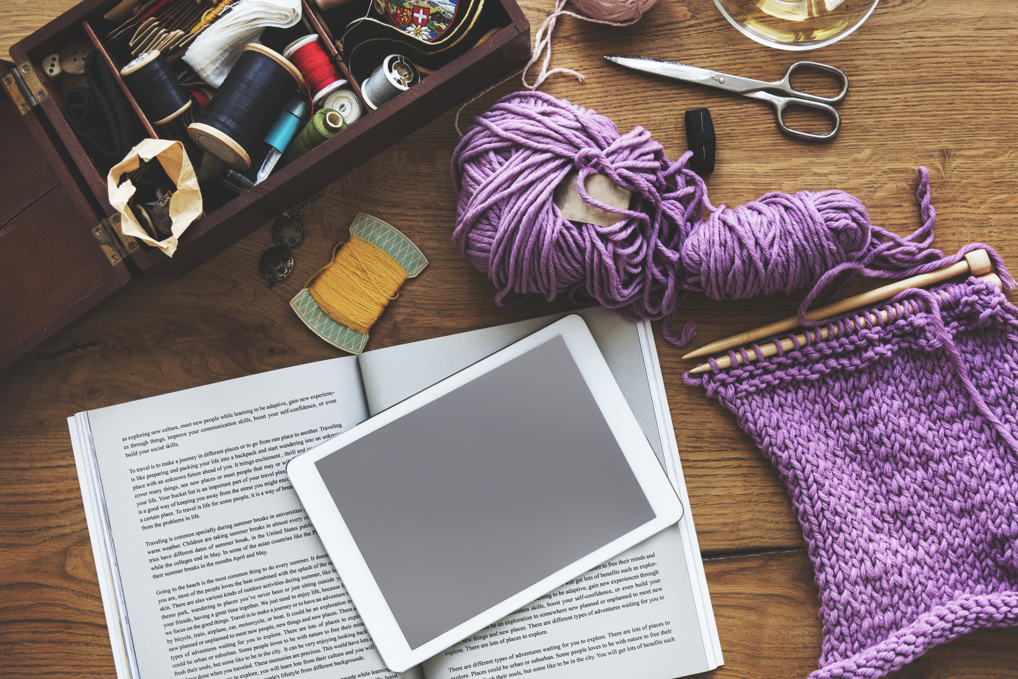 Flatlay with threads and curriculum booklet